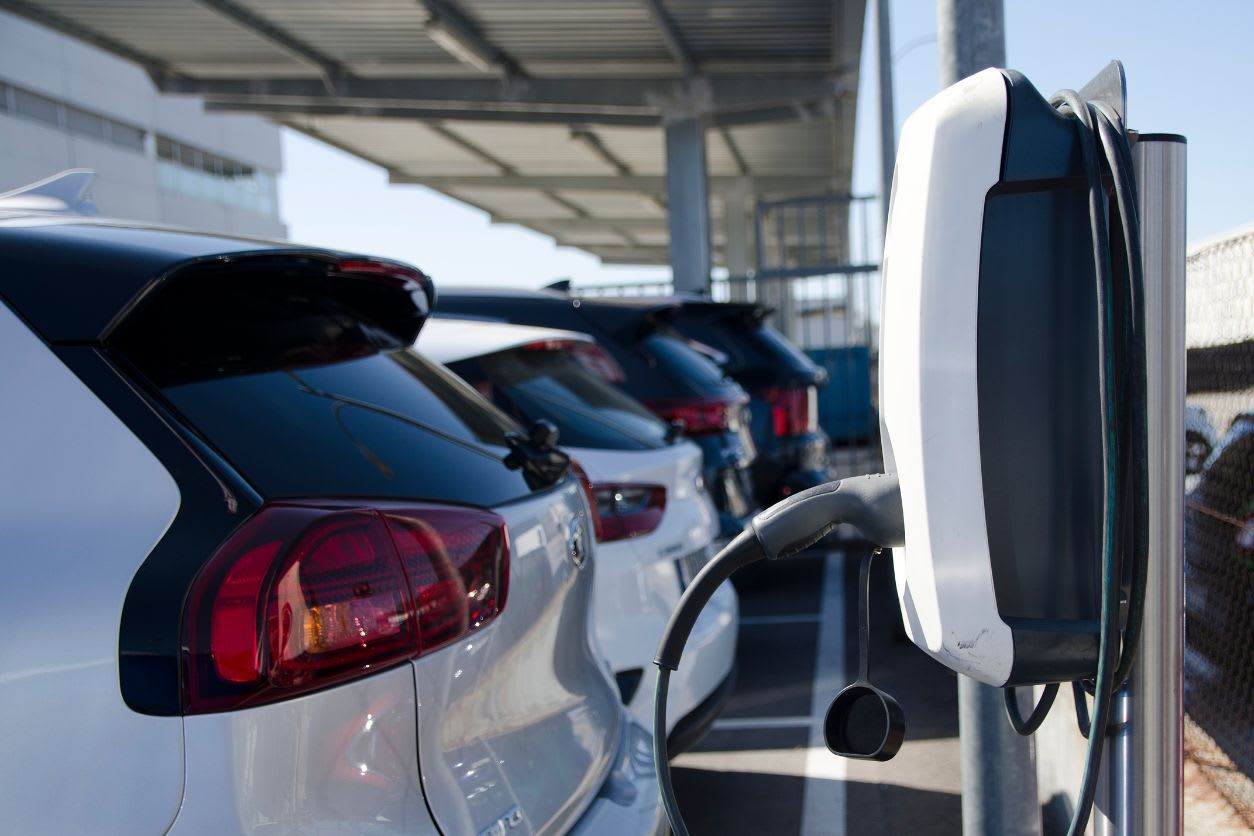 multiple vehicles and an ev charger